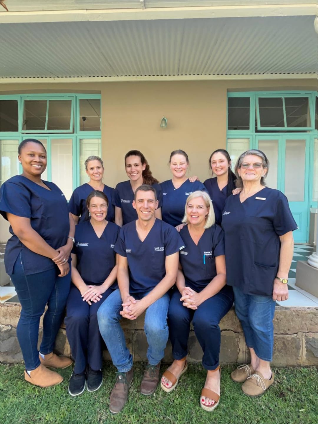 The Ludolf & Lienkie Physiotherapists team on the porch at 30 Milner Street, Kimberley
